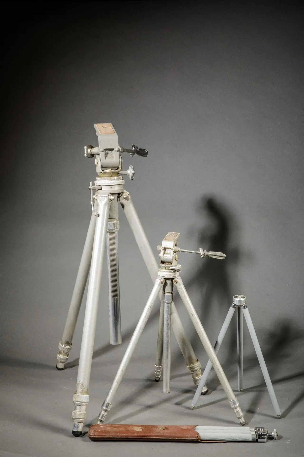 Set of four tripods, including a Gitzo No. 3. - Lot 94