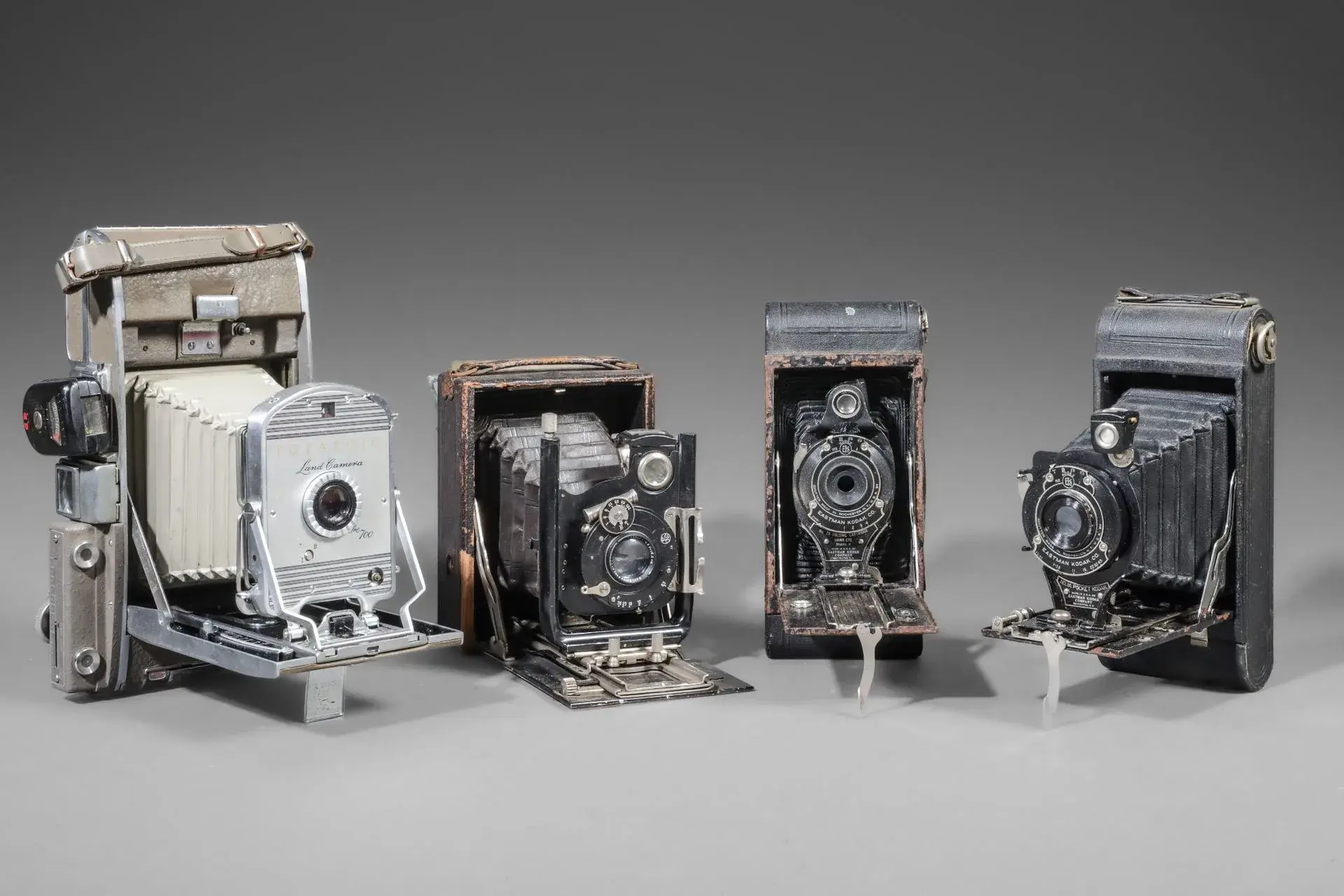Set of four assorted cameras. Polaroid Land Camera The 700 ( - Lot 48