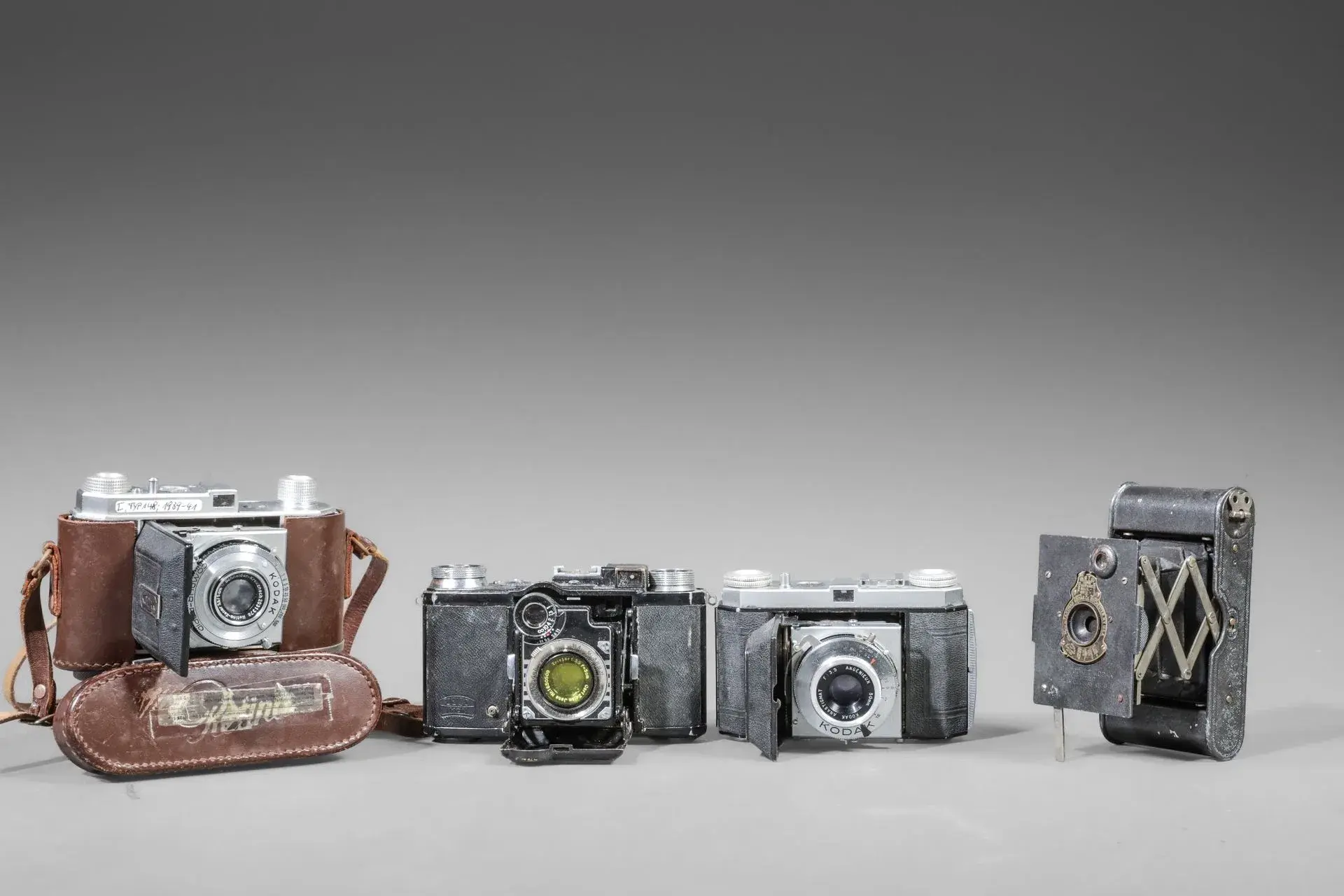 Set of four assorted cameras. Kodak Retina camera body with - Lot 64