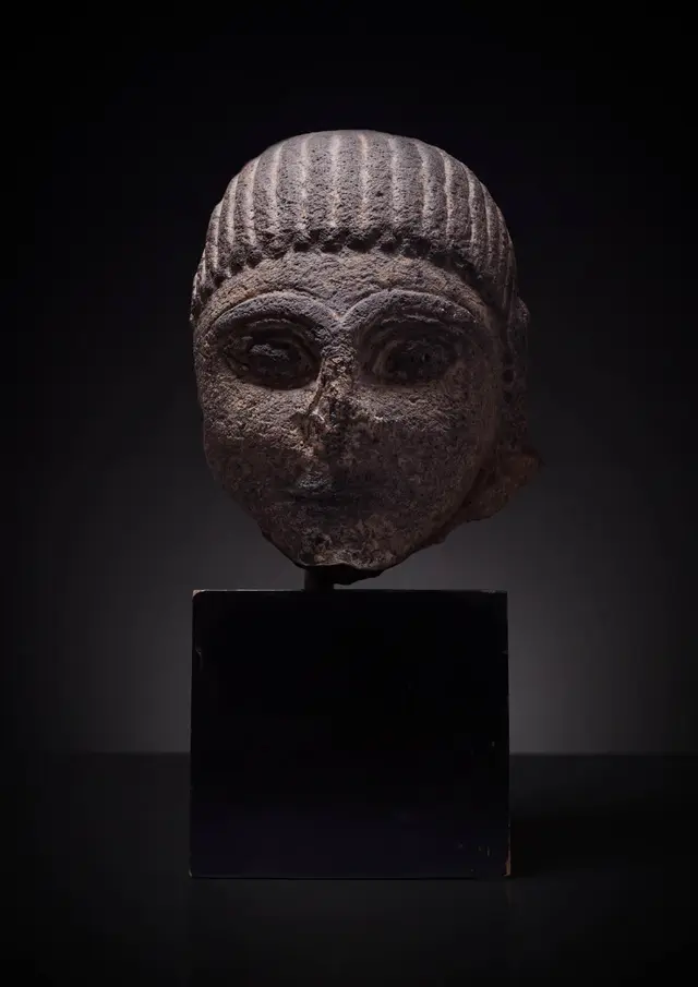 RARE ETRUSCAN NENFRO HEAD OF SPHINX