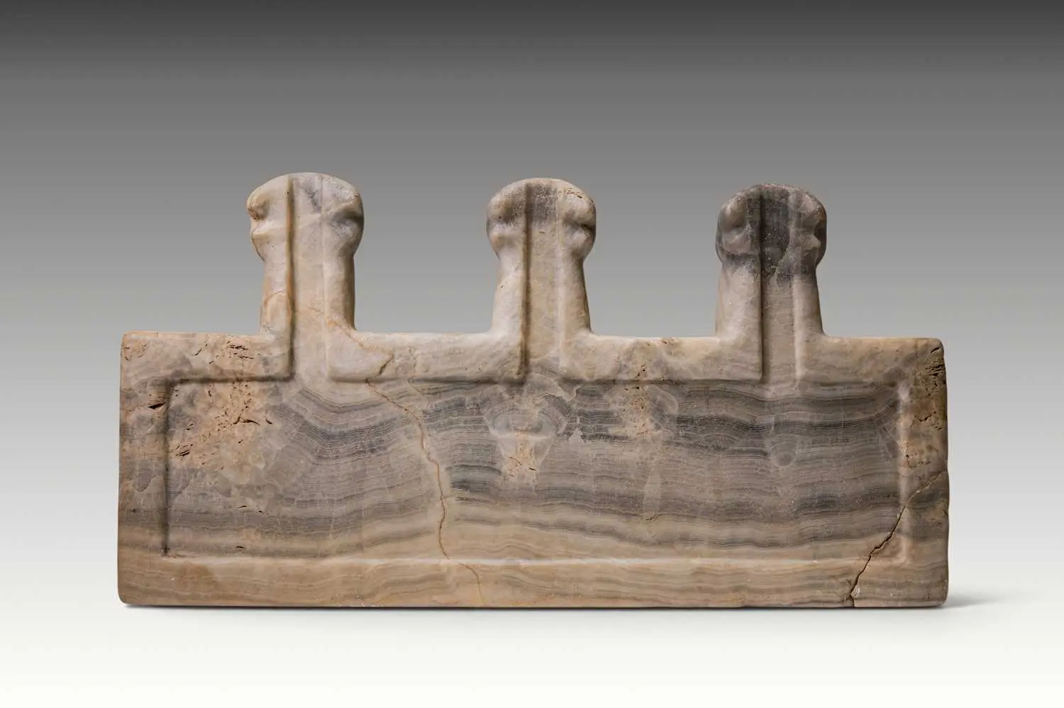 SOUTH ARABIAN MARBLE RITUAL TABLE WITH THREE SPOUTS