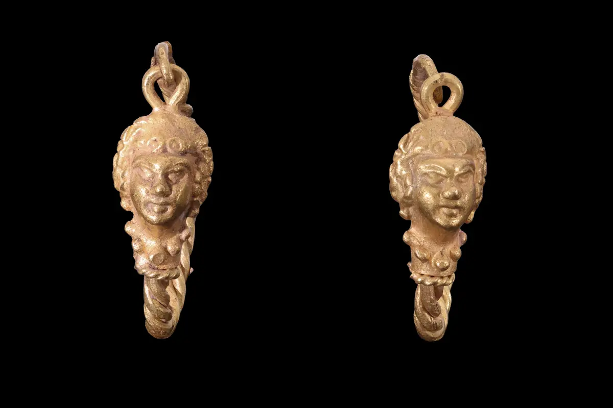 MATCHED PAIR OF HELLENISTIC GOLD EARRINGS WITH LION HEADS