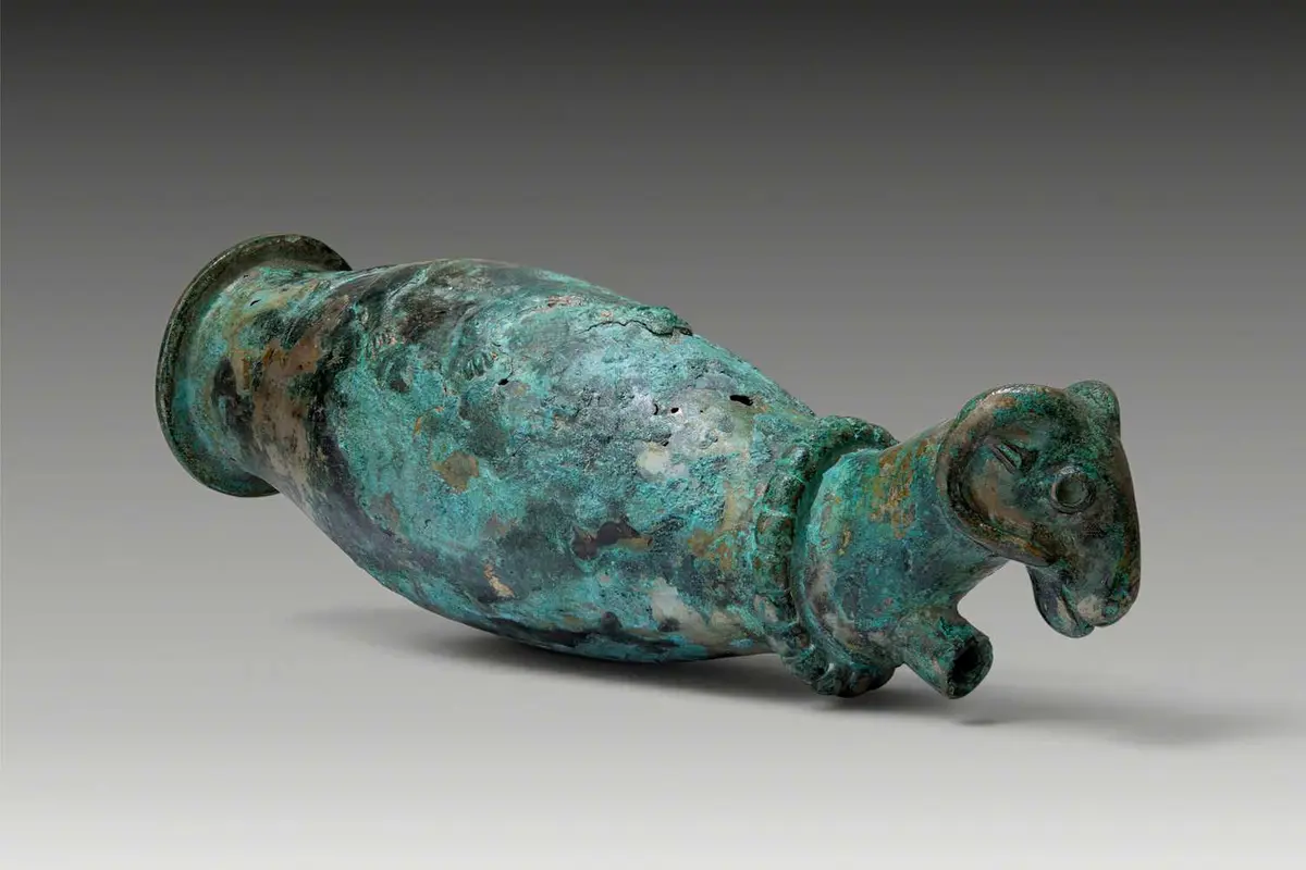 LATE ELAMITE BRONZE RHYTON WITH RAM PROTOME