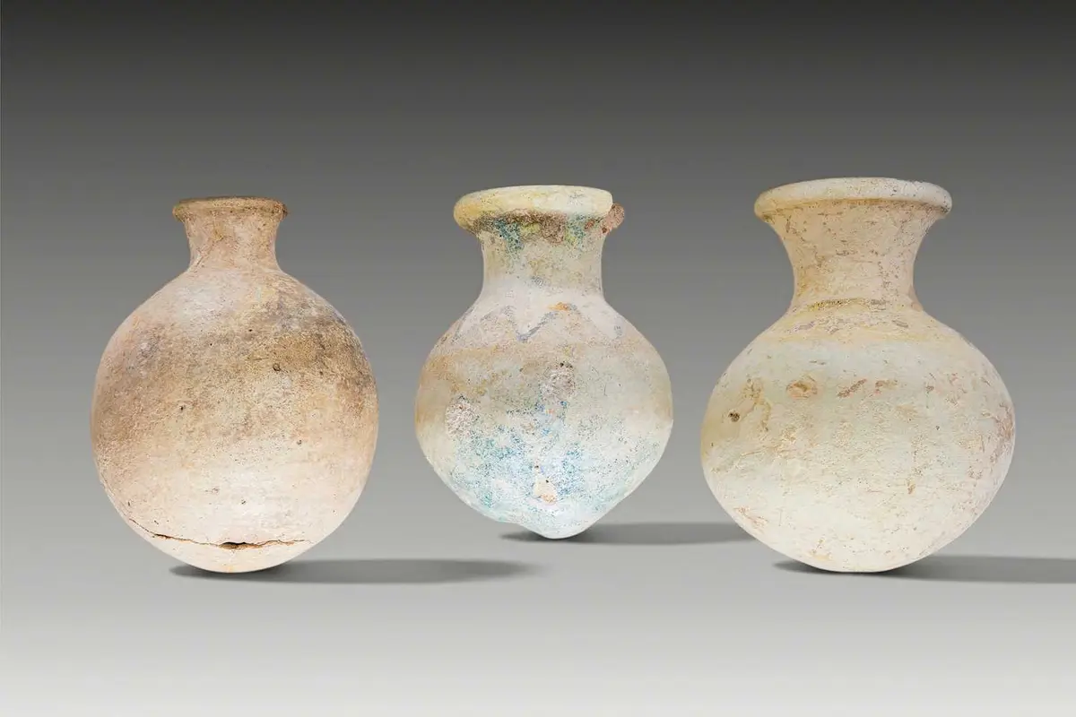 COLLECTION OF NEO-ASSYRIAN GLAZED-COMPOSITION BOTTLES