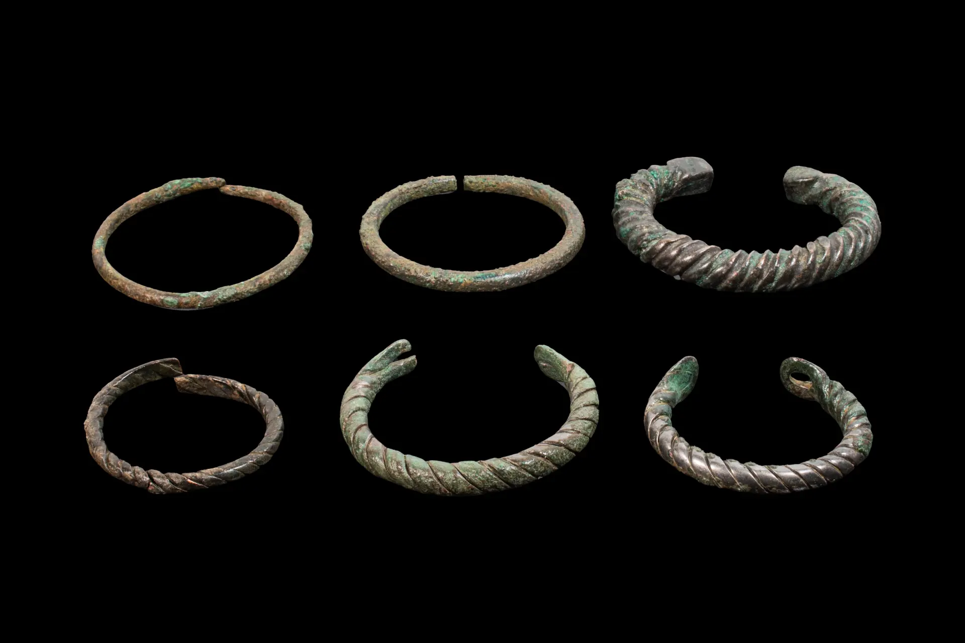 COLLECTION OF CELTIC BRONZE BANGLES