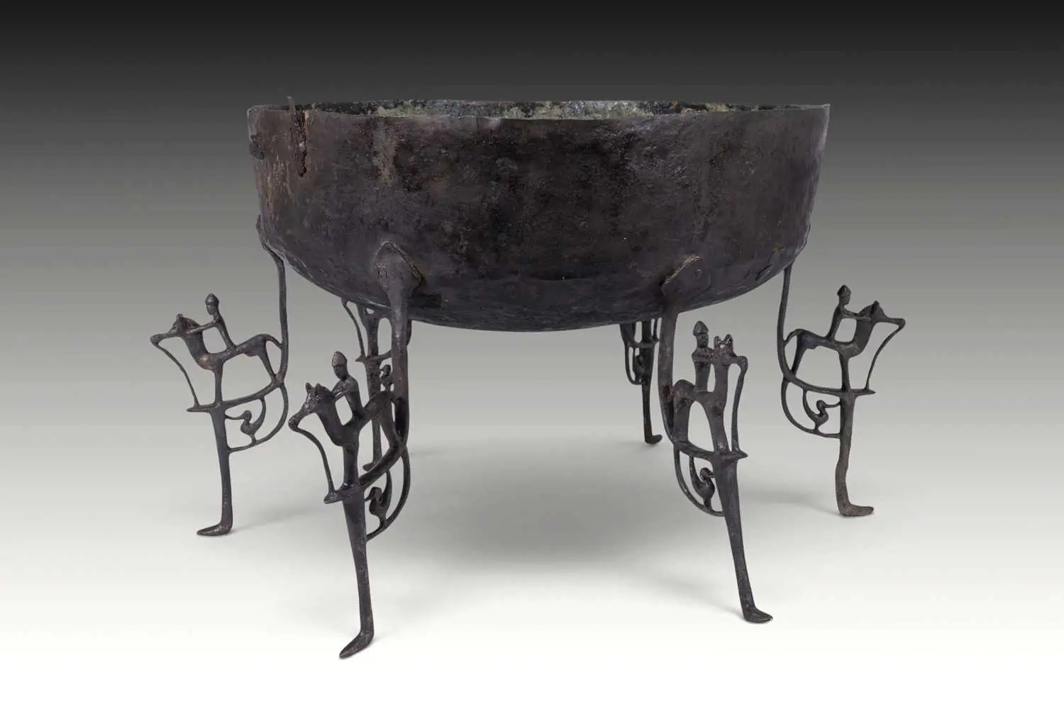 LATE VILLANOVAN AND ETRUSCAN BRONZE BASIN WITH FIGURAL LEGS