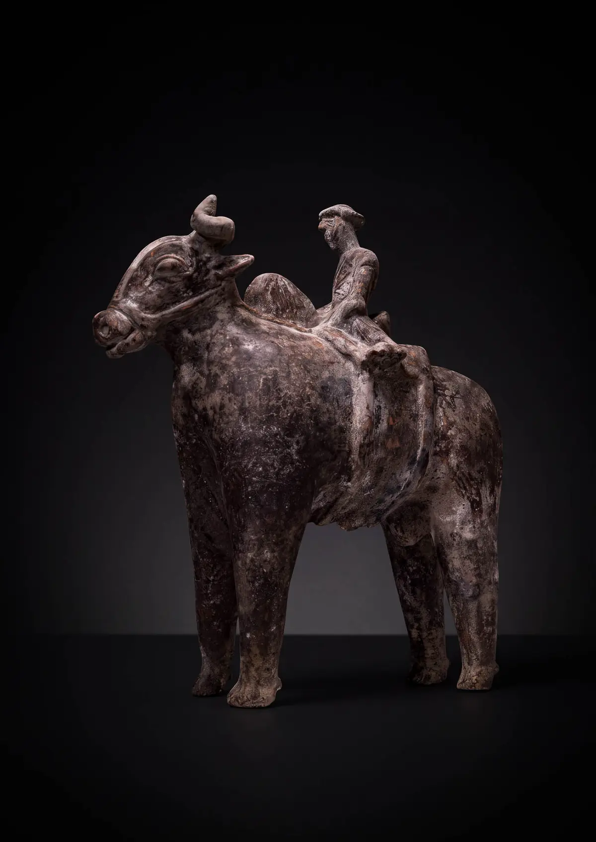 MASSIVE SOUTH ARABIAN FIGURINE OF A RIDER ON A BULL