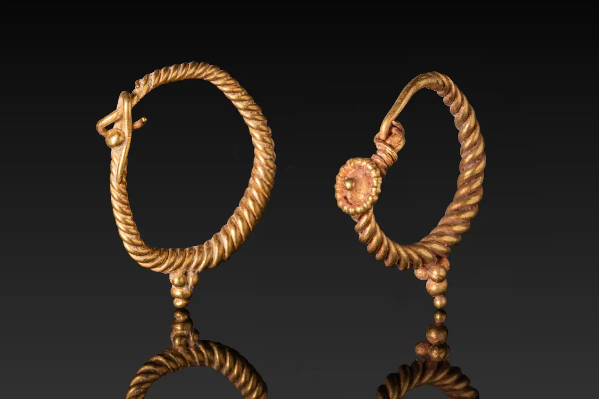 PAIR OF HELLENISTIC HIGH KARAT GOLD TWISTED EARRINGS