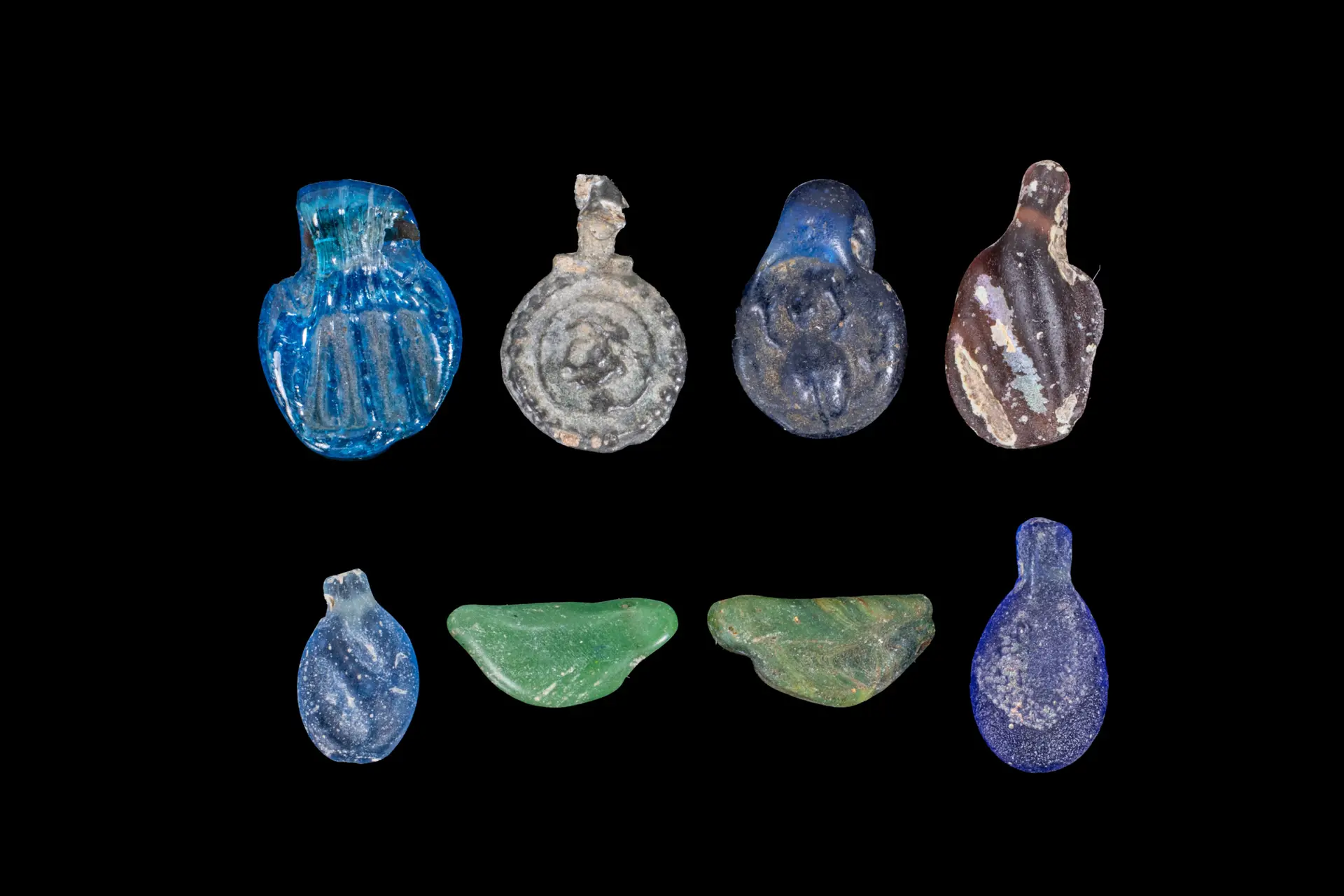 COLLECTION OF ROMAN GLASS PENDANTS