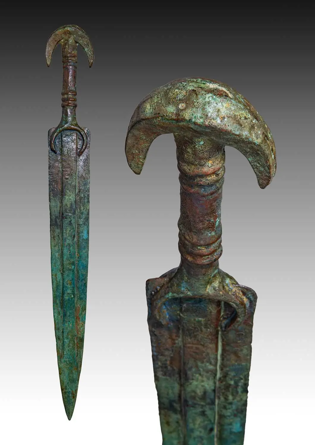 LATE BRONZE AGE BRONZE SWORD WITH CRESCENT POMMEL