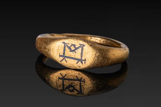 MEROVINGIAN HIGH KARAT GOLD RING WITH NIELLO MONOGRAM