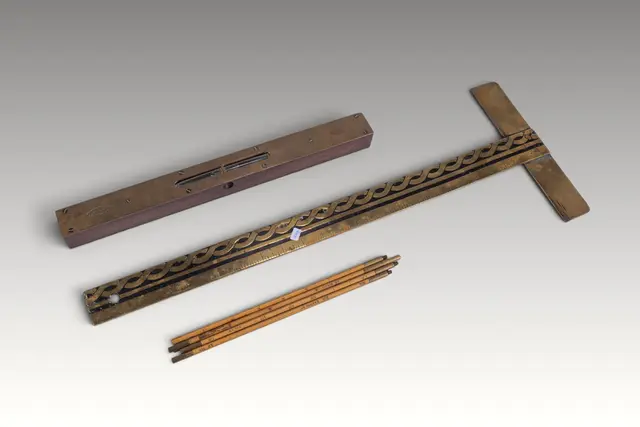 GROUP OF VINTAGE DRAFTING AND MEASURING TOOLS