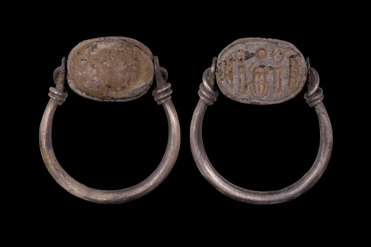 EGYPTIAN FAIENCE SCARAB WITH KHEPRI, PAPYRUS STEMS AND A SOLAR DISC
