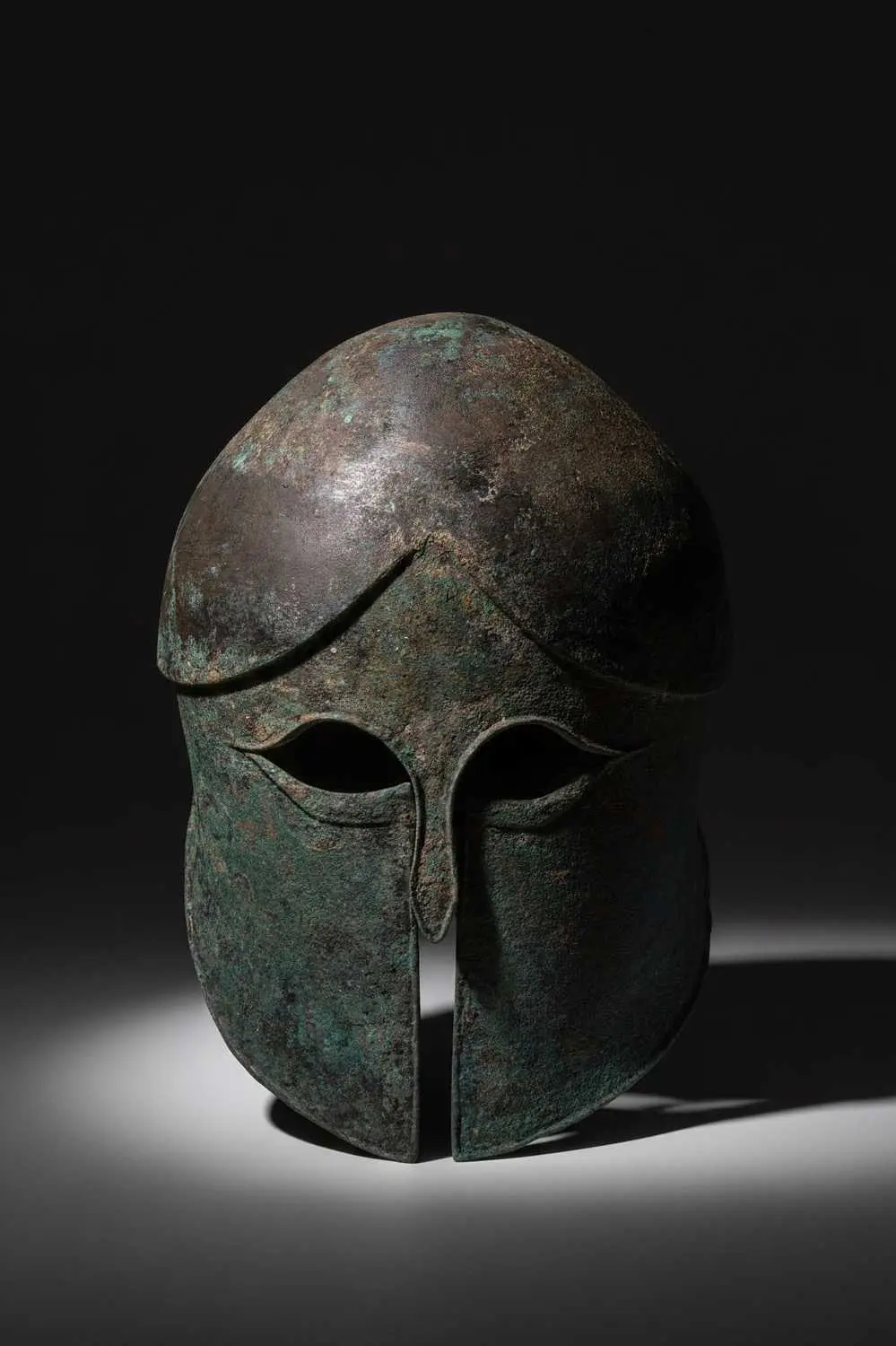 RARE CORINTHIAN BRONZE HELMET OF THE HERMIONE TYPE