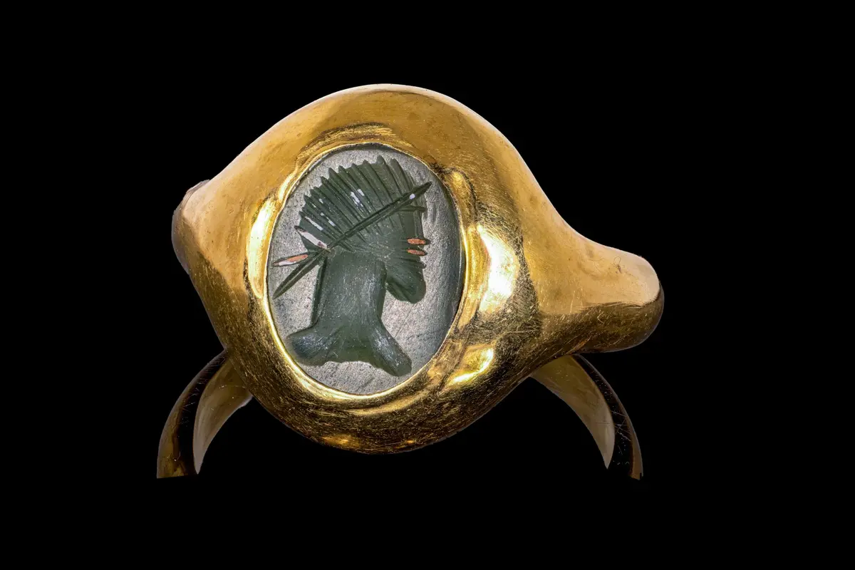 ROMAN GREEN CHALCEDONY INTAGLIO OF A GOD IN GOLD RING