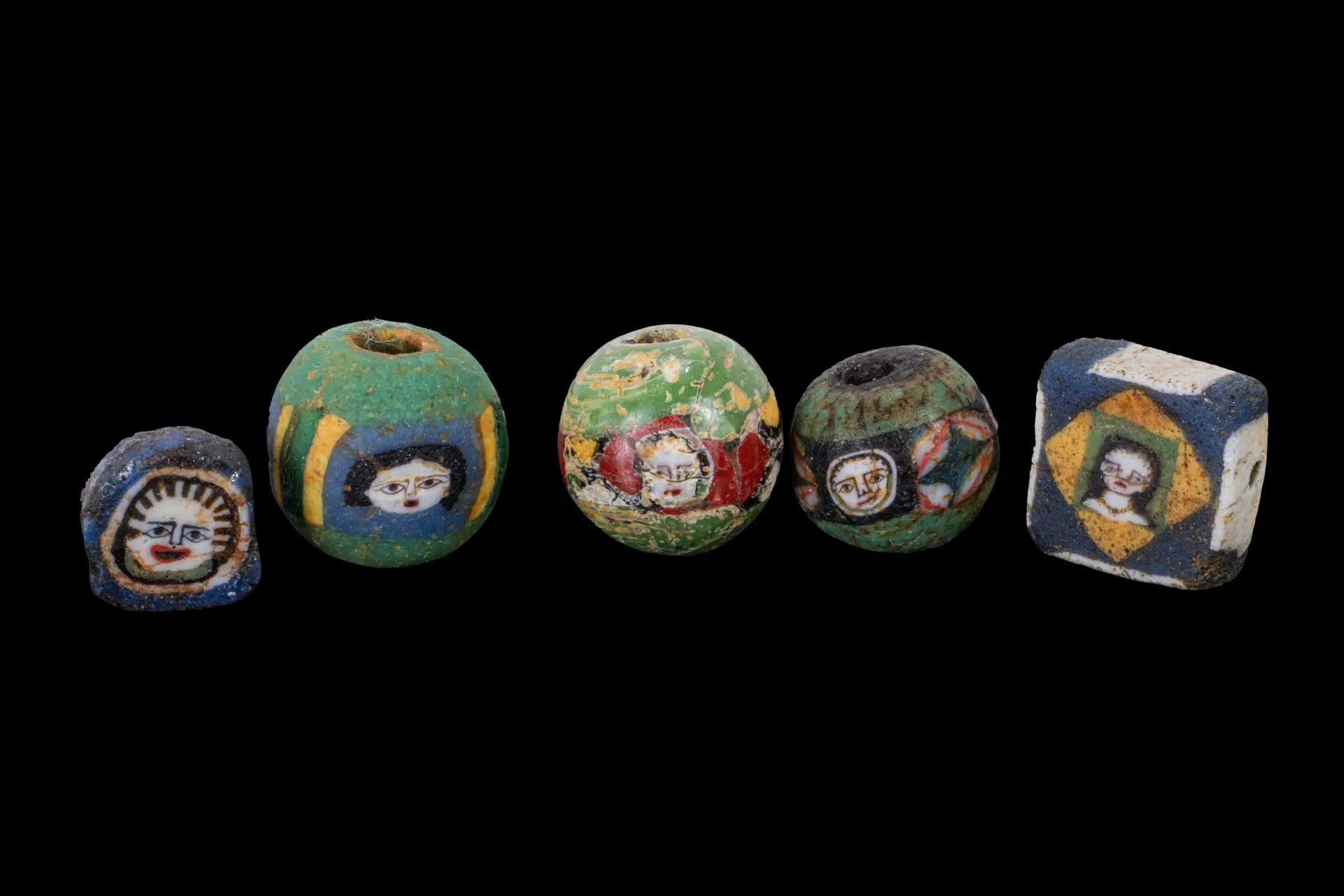 COLLECTION OF ROMAN MOSAIC GLASS BEADS WITH FACES