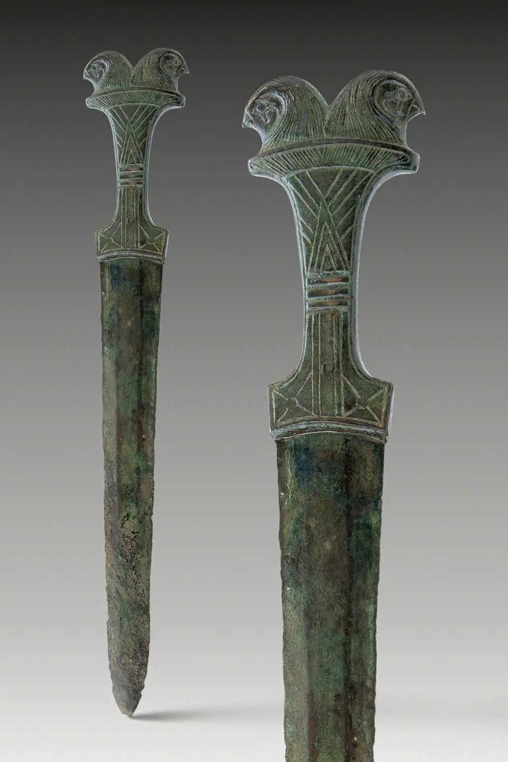 EGYPTIAN BRONZE DAGGER WITH DOUBLE FALCON-HEADED POMMEL