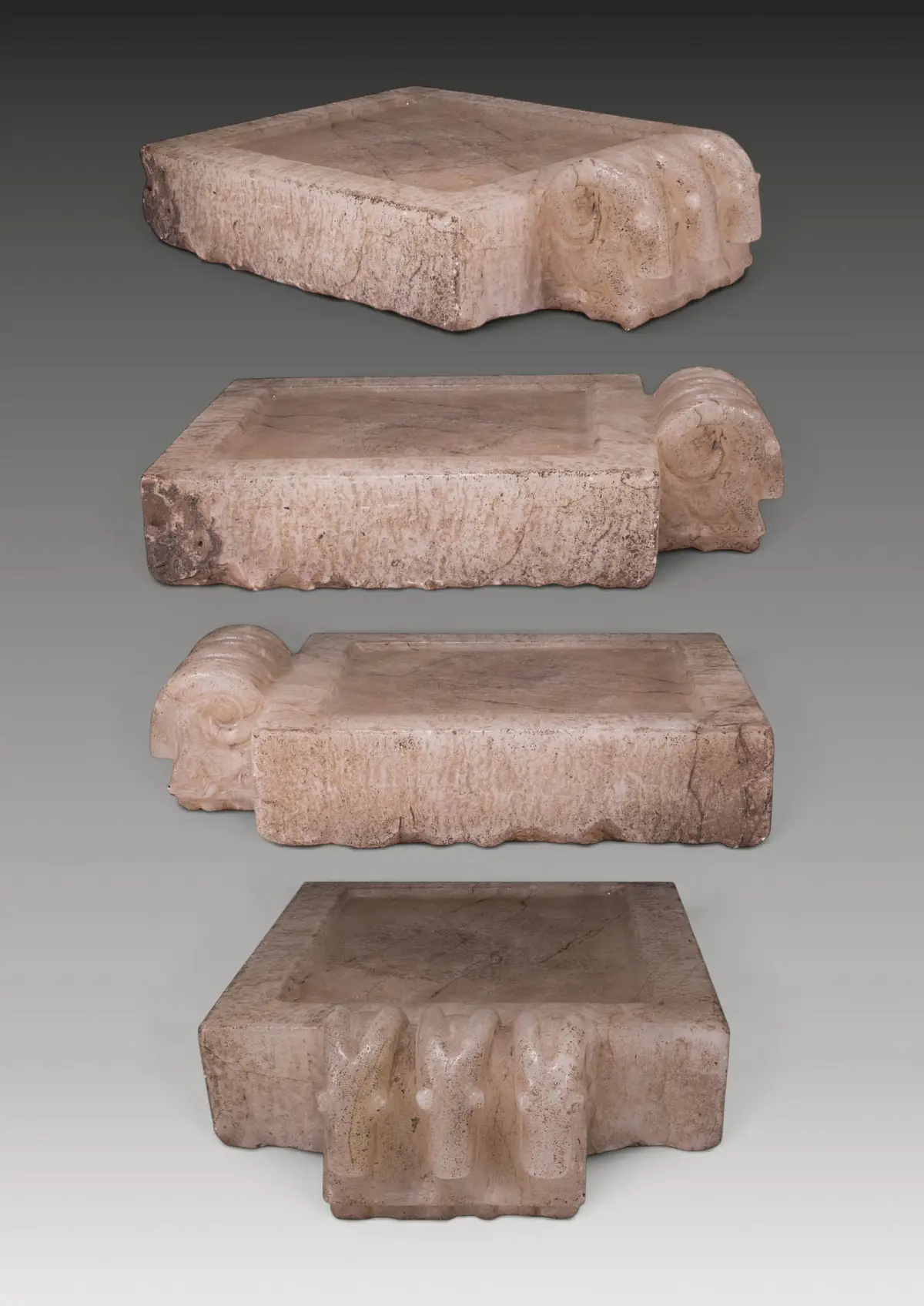 SOUTH ARABIAN MARBLE RITUAL TABLE WITH THREE IBEXES