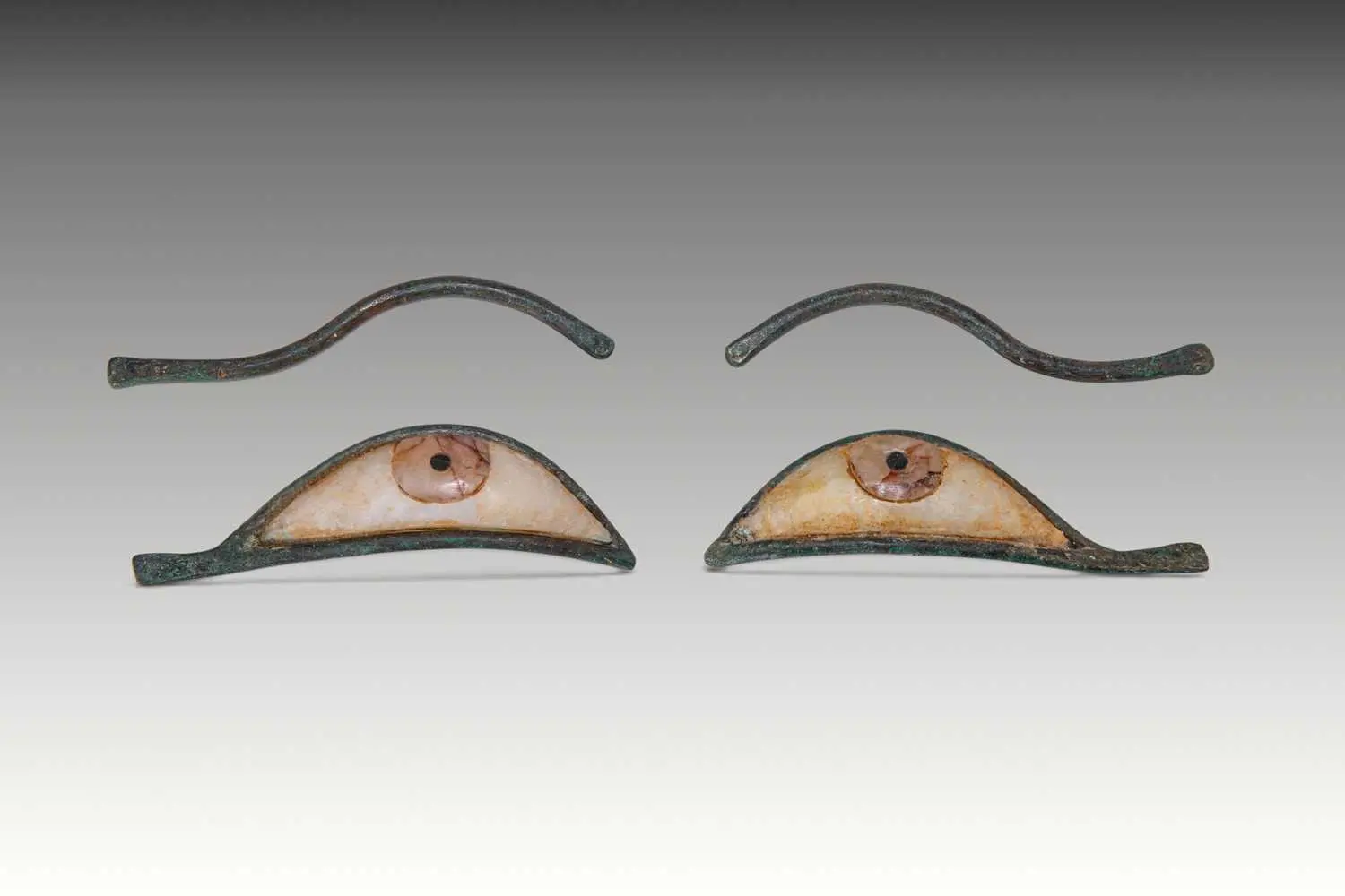 EGYPTIAN BRONZE AND STONE MUMMY EYES WITH BROWS