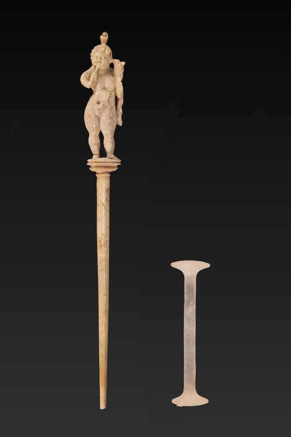 ROMAN BONE HAIRPIN WITH HARPOCRATES AND STONE ROD