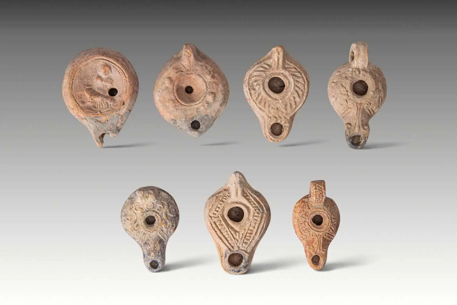 COLLECTION OF ROMAN TERRACOTTA OIL LAMPS