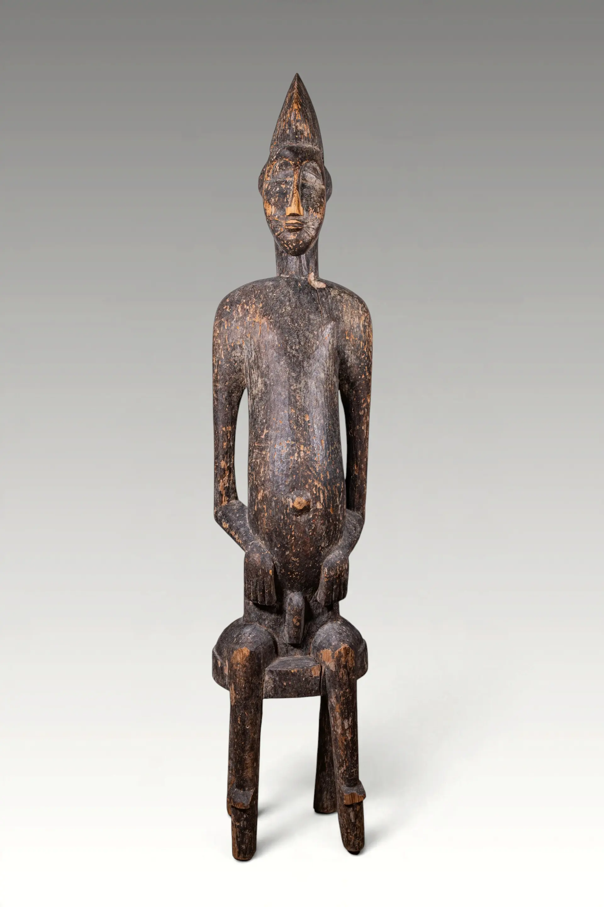 LARGE IVORY COAST SENOFO SEATED ANCESTRAL FIGURE