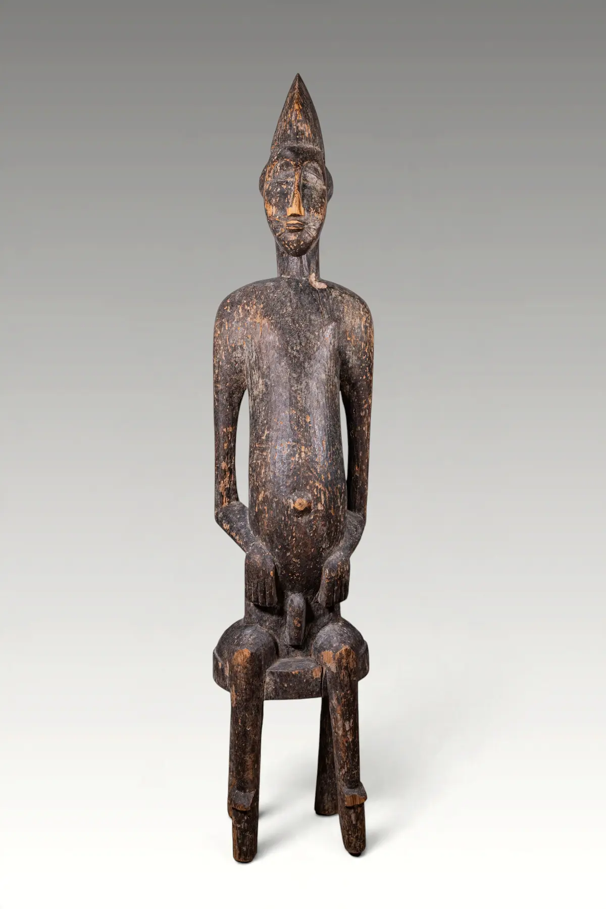 LARGE IVORY COAST SENOFO SEATED ANCESTRAL FIGURE