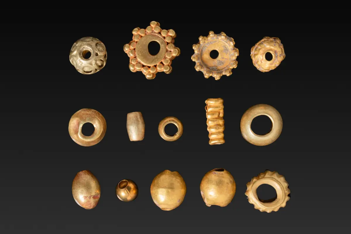 LARGE COLLECTION OF GREEK HIGH KARAT GOLD BEADS