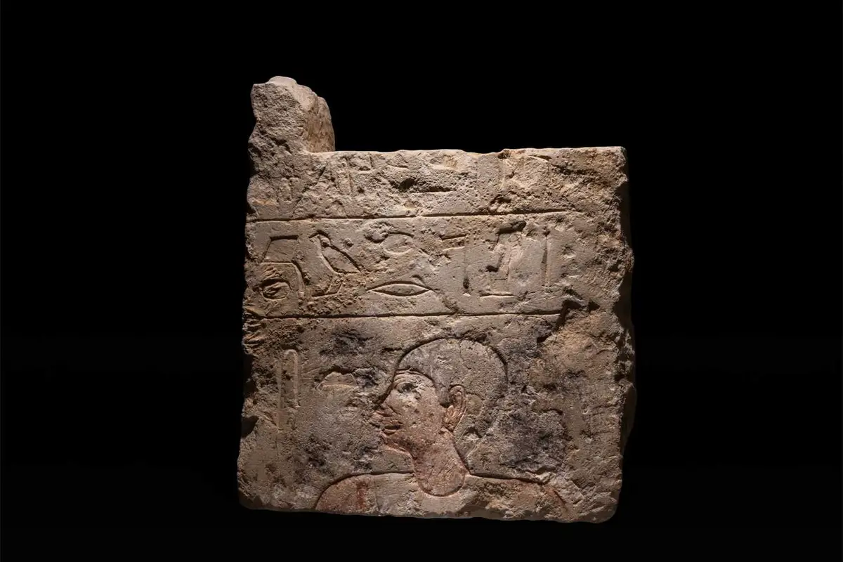 EGYPTIAN LIMESTONE FUNERARY WALL RELIEF DEPICTING A MALE FIGURE IN