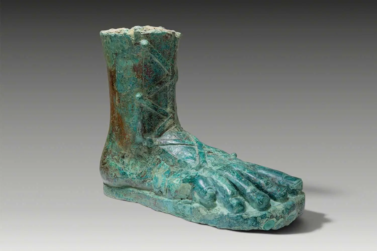 LIFE-SIZE ROMAN BRONZE FOOT WITH CALIGA