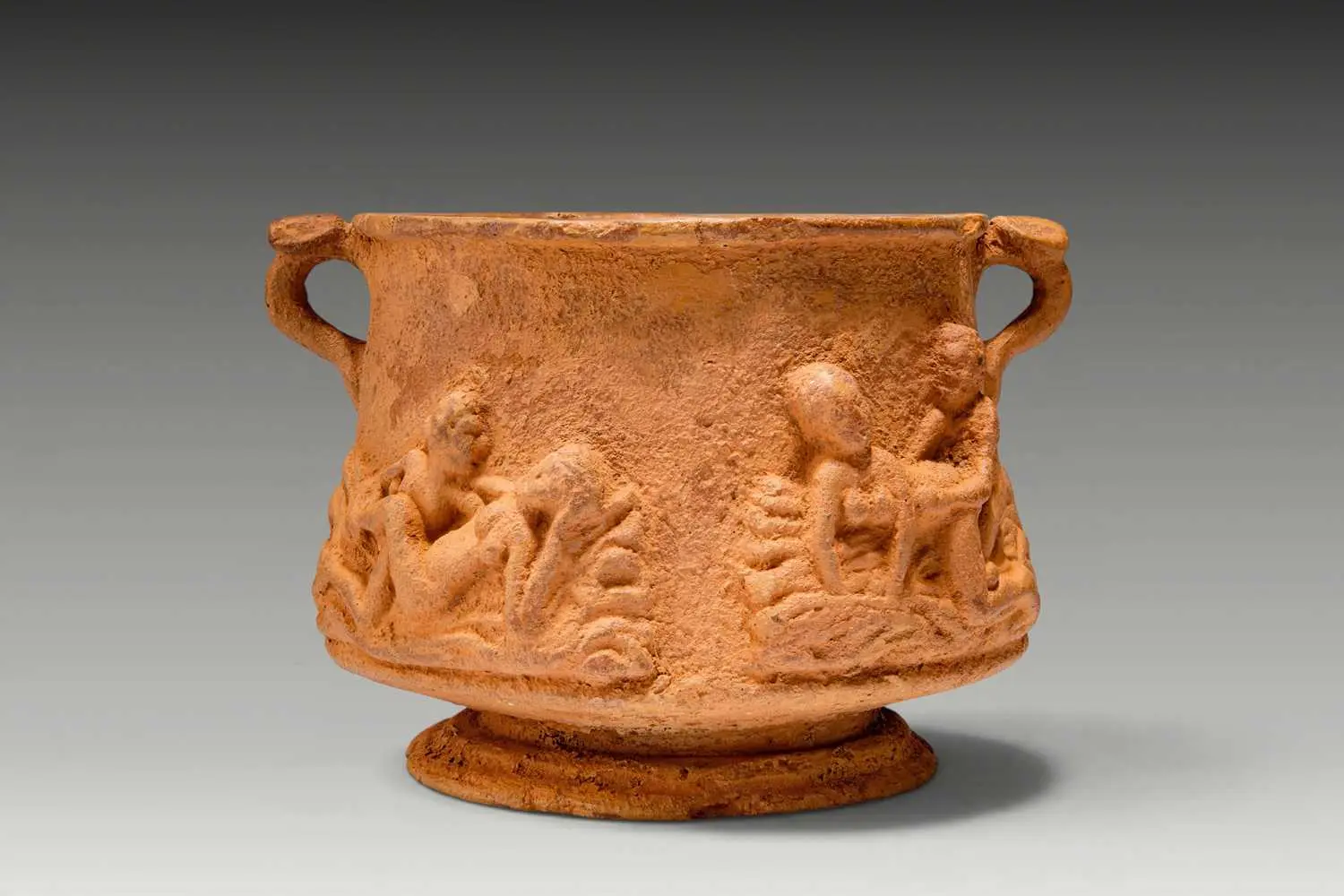 ROMAN TERRACOTTA SKYPHOS WITH EROTIC SCENES