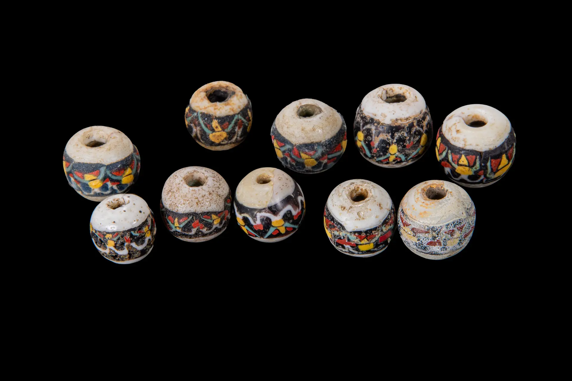 COLLECTION OF ROMAN MOSAIC GLASS BEADS WITH GEOMETRIC MOTIFS
