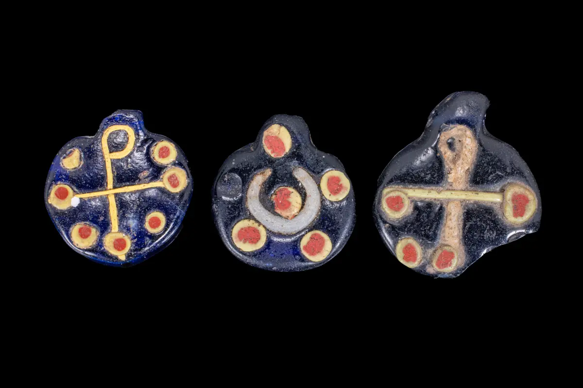 UNIQUE BYZANTINE POLYCHROME GLASS PENDANTS WITH CHI-RHO AND CRESCENT MOTIFS