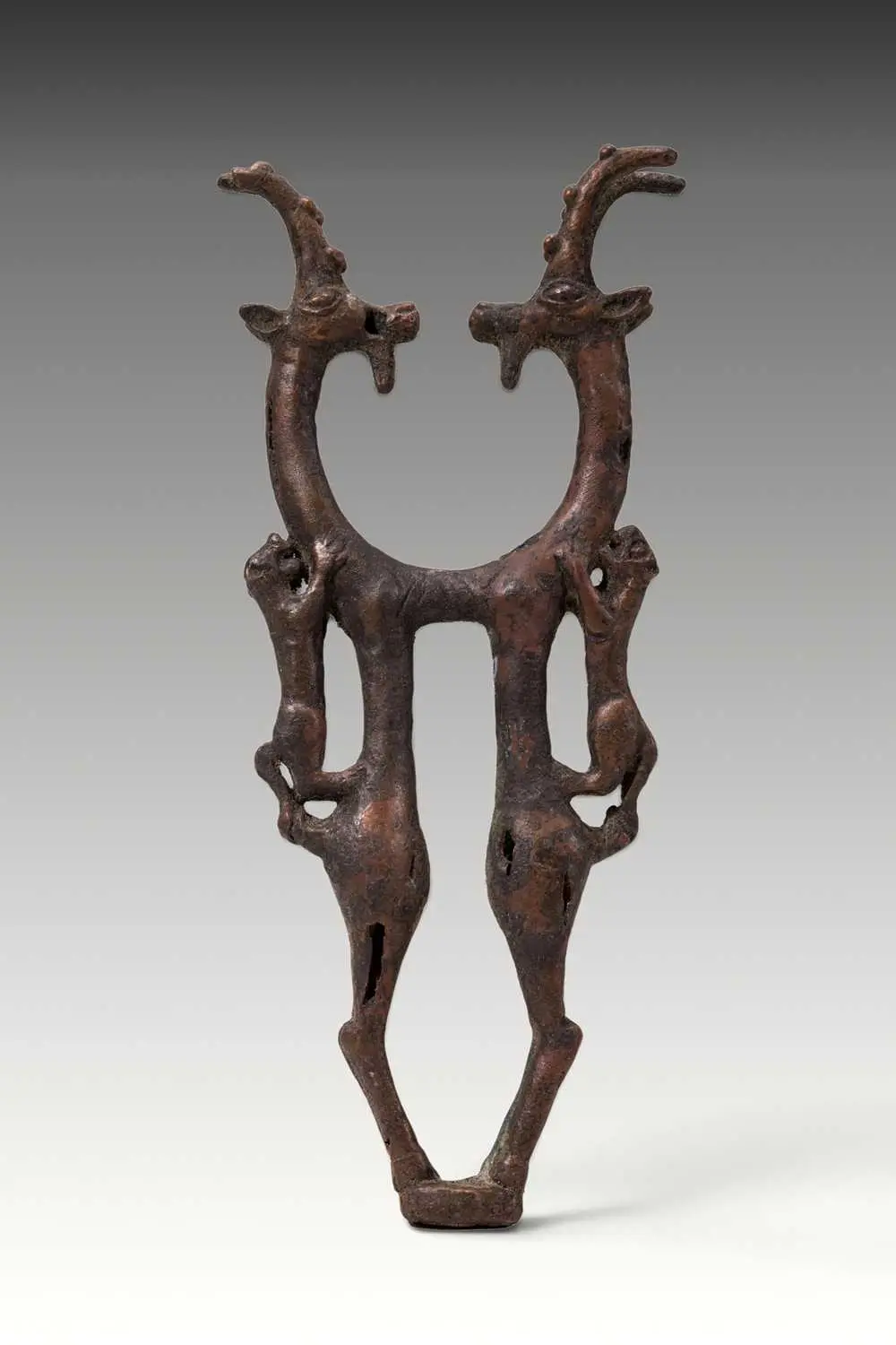 BRONZE AGE BRONZE SCEPTRE HEAD WITH IBEXES ATTACKED BY LIONS