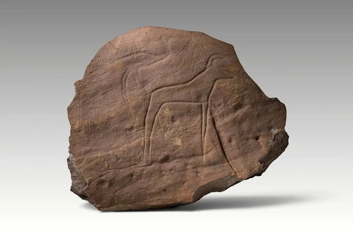 EGYPTIAN PREDYNASTIC ENGRAVED STONE WITH ANTELOPE