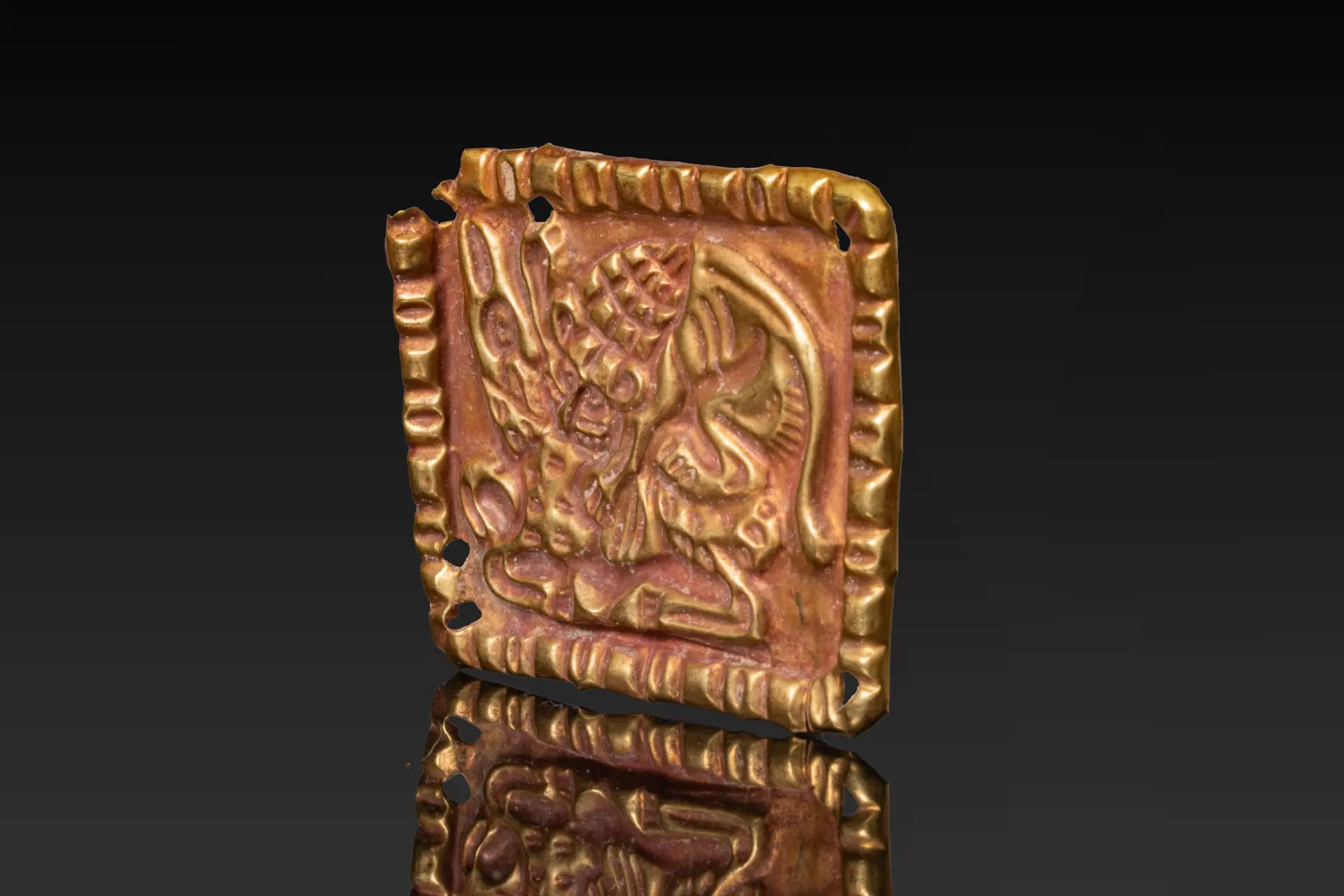 SCYTHIAN REPOUSS� HIGH KARAT GOLD PLAQUE WITH LION AND DEER