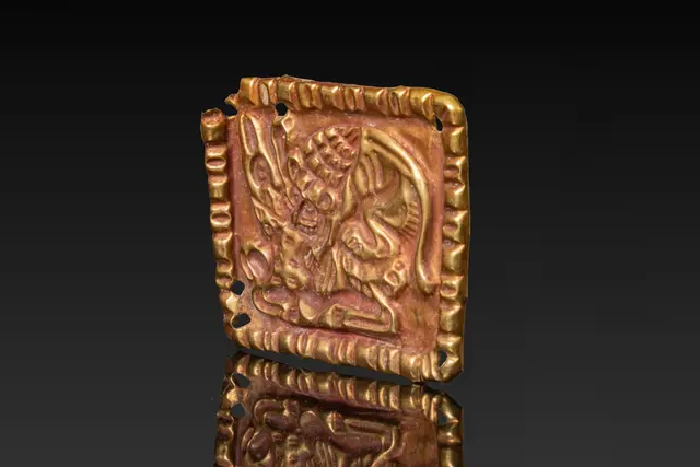 SCYTHIAN REPOUSS� HIGH KARAT GOLD PLAQUE WITH LION AND DEER