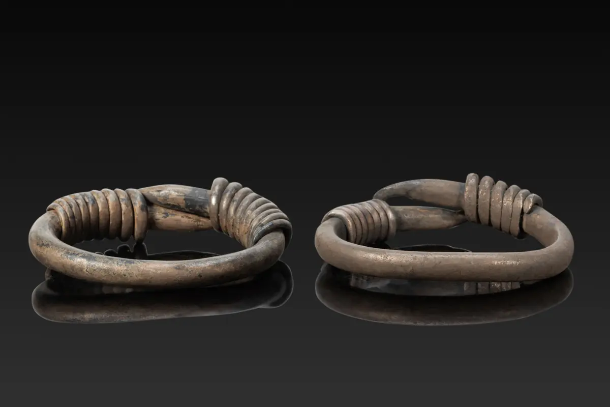 MATCHED PAIR OF ROMANO-EGYPTIAN SILVER BRACELETS