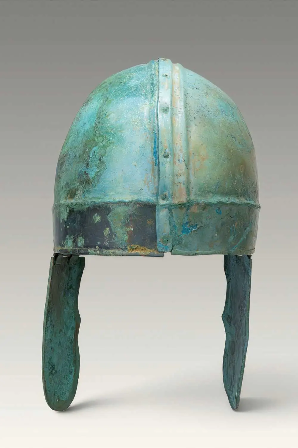 GREEK CHALCIDIAN BRONZE HELMET WITH CHEEK PIECES