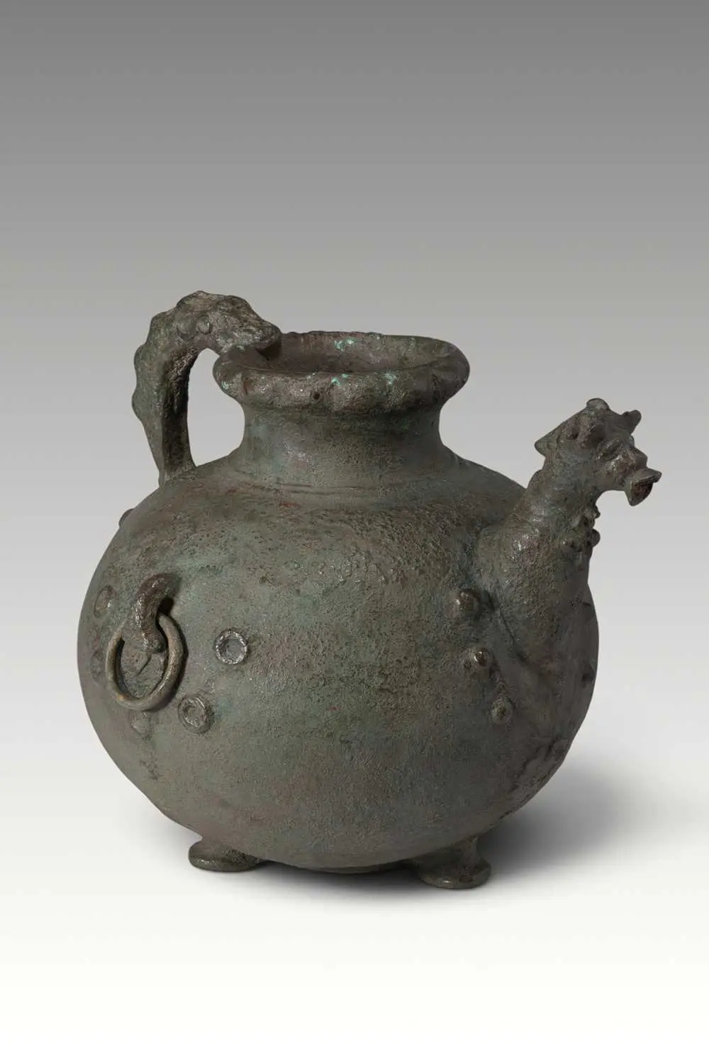 LARGE URARTIAN BRONZE JUG WITH ANIMAL PROTOME