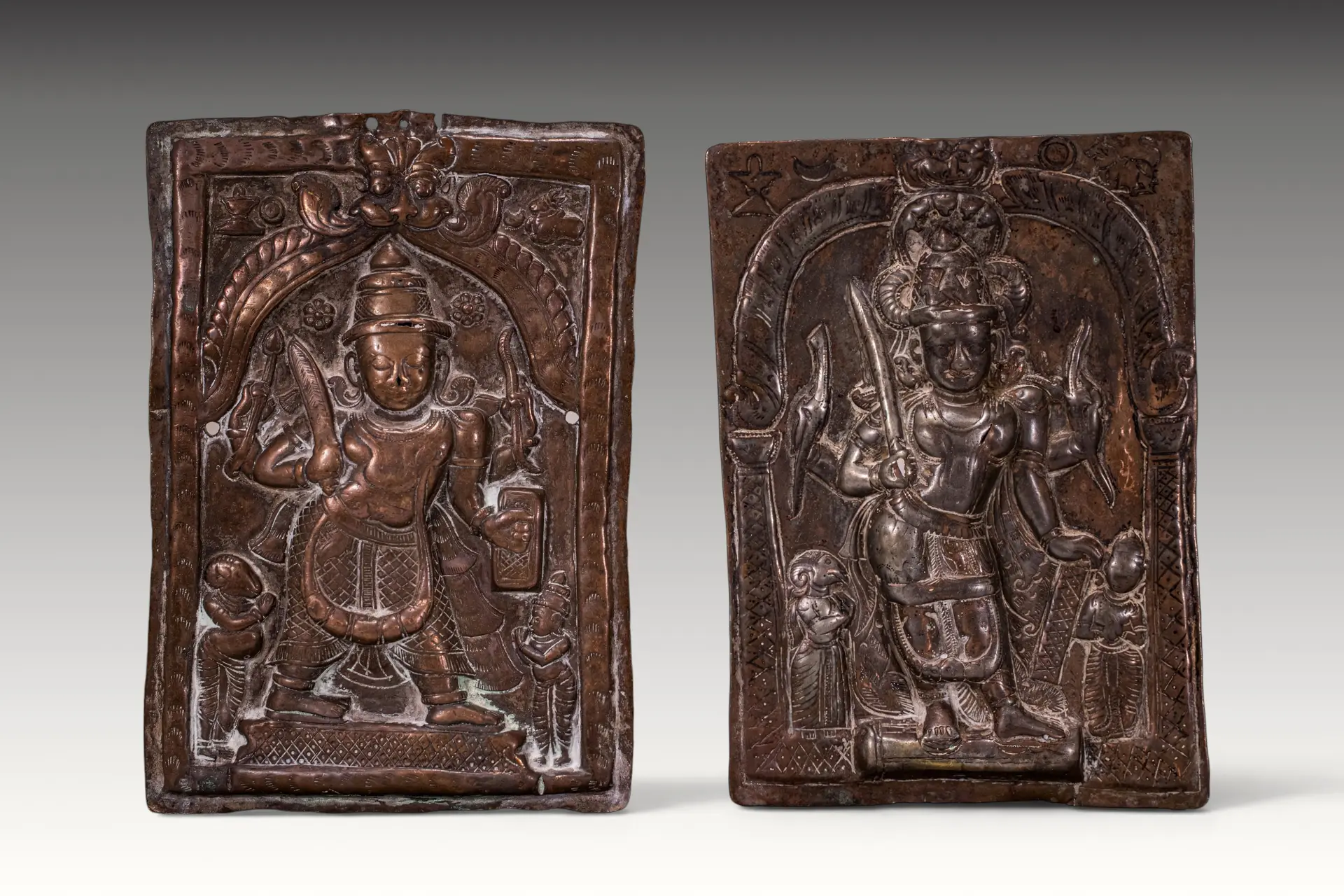 PAIR OF CEREMONIAL COPPER SHIELDS DEPICTING VIRABHADRA