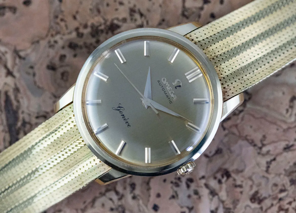 Omega 14702 Genève Dress Watch Automatik orig. Goldband Papiere 1966