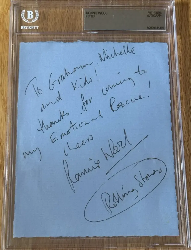 The Rolling Stones: Ronnie Wood Signed 7" x 5" Cut (Beckett Encapsulated)