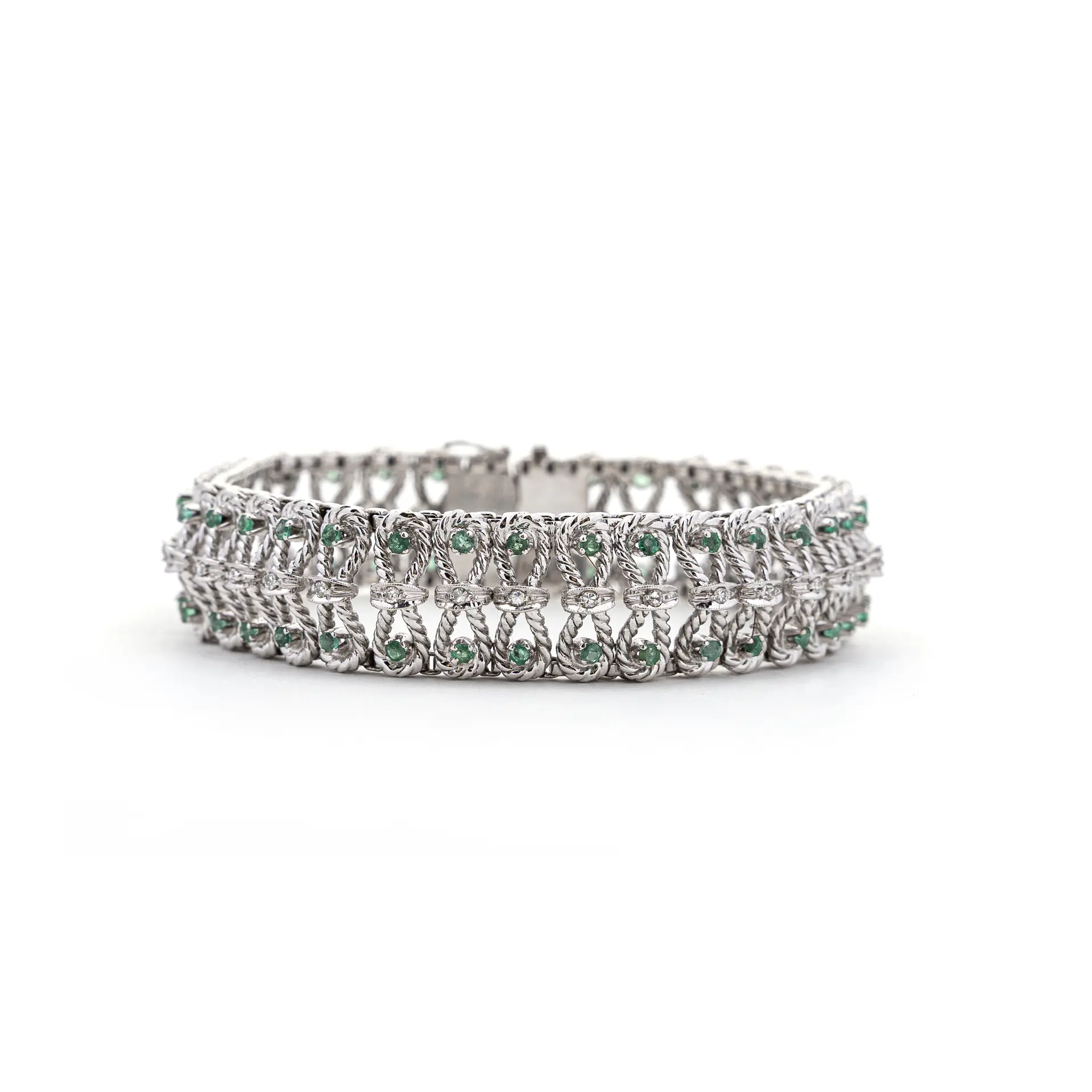 Bracciale con Smeraldi e Diamanti. Oro bianco 18kt, punzone dell'oro.