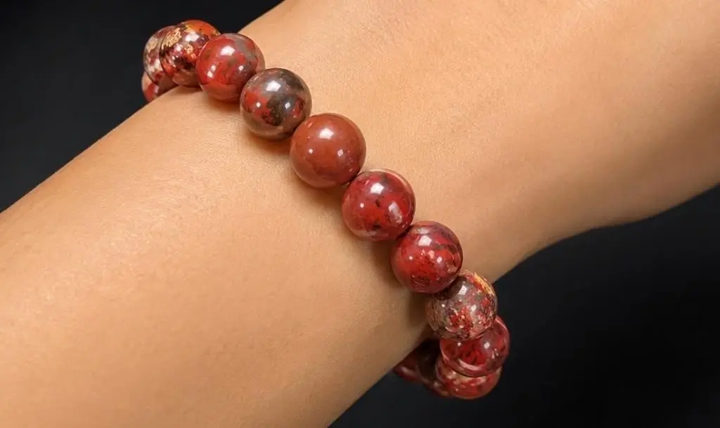 $50, red jasper bracelet flexible, retail value $