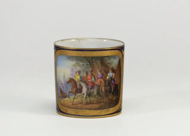 SÈVRES – Porcelain cup with a blue background, richly decora - Lot 212