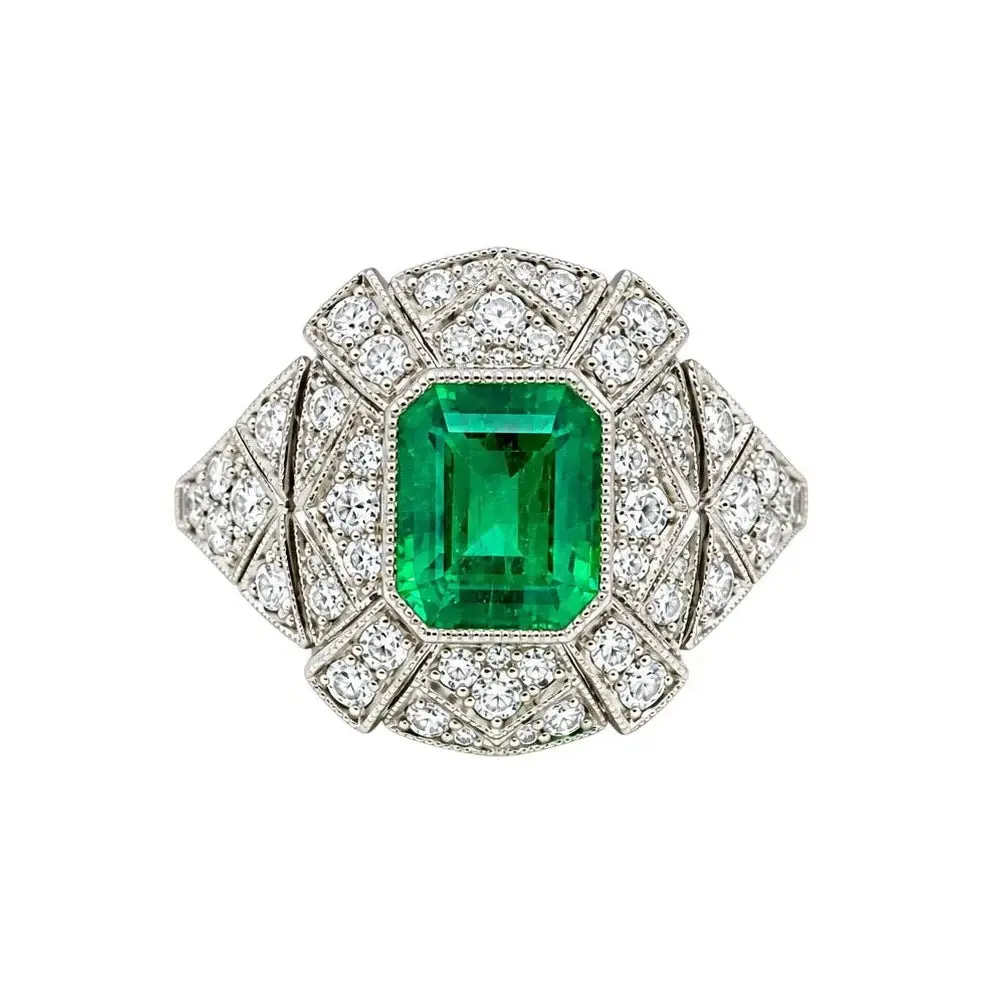 Bague Entourage en platine, émeraude et diamants
