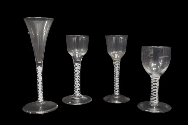 Group of four opaque twist stem glasses