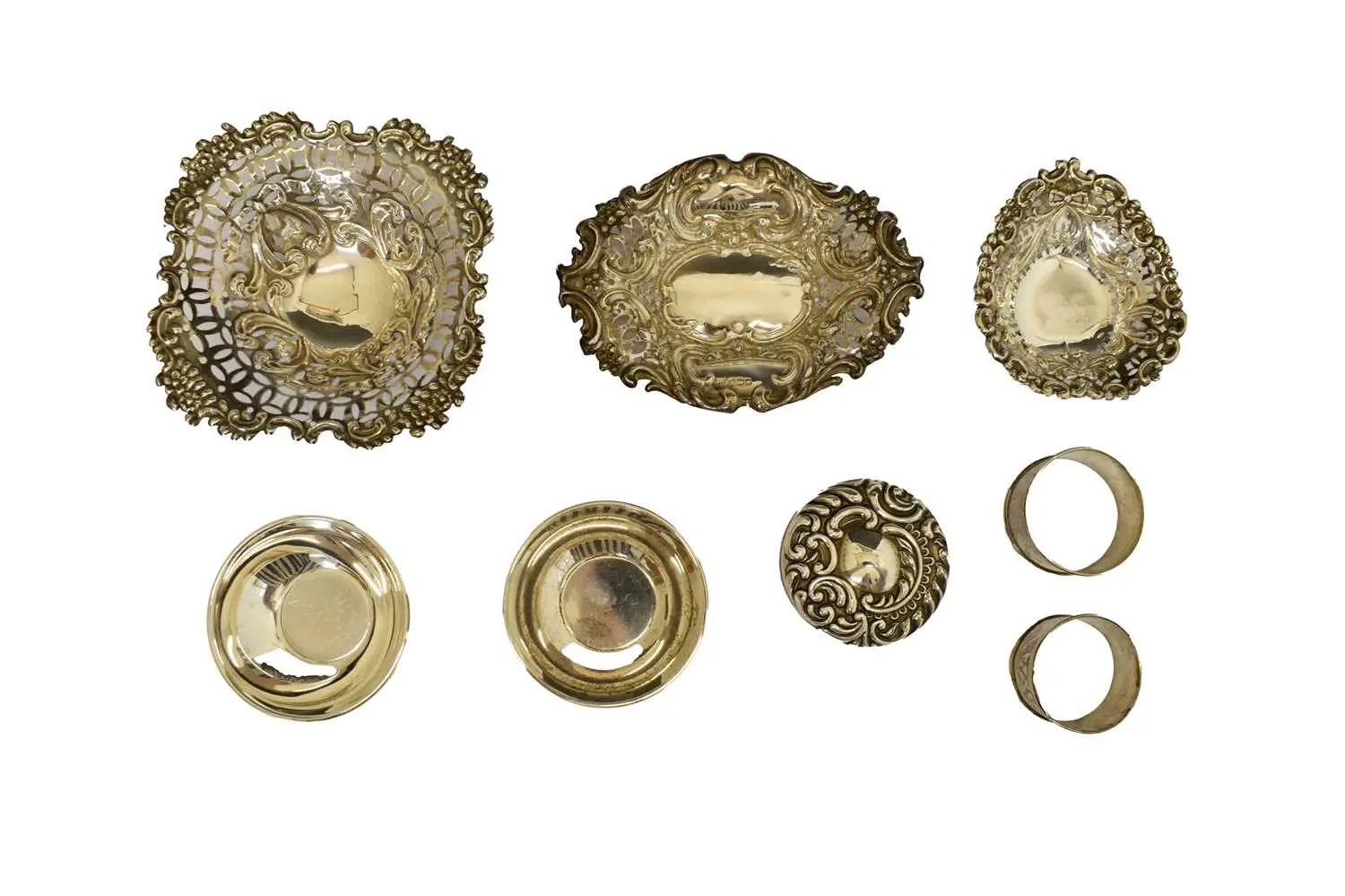 Collection of silver to include three silver bon bon dishes, napkin rings, etc