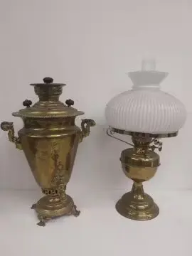 A 19th century brass tea urn with cyrillic inscription and a 19th